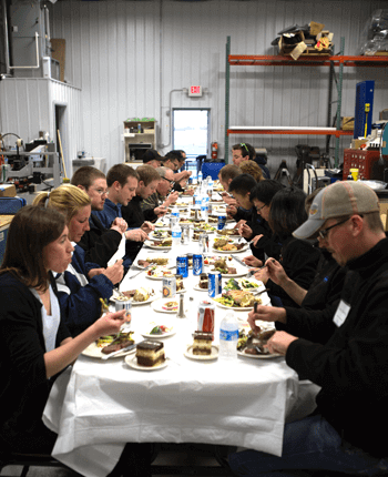 The group enjoying a delicious meal The group enjoying a delicious meal